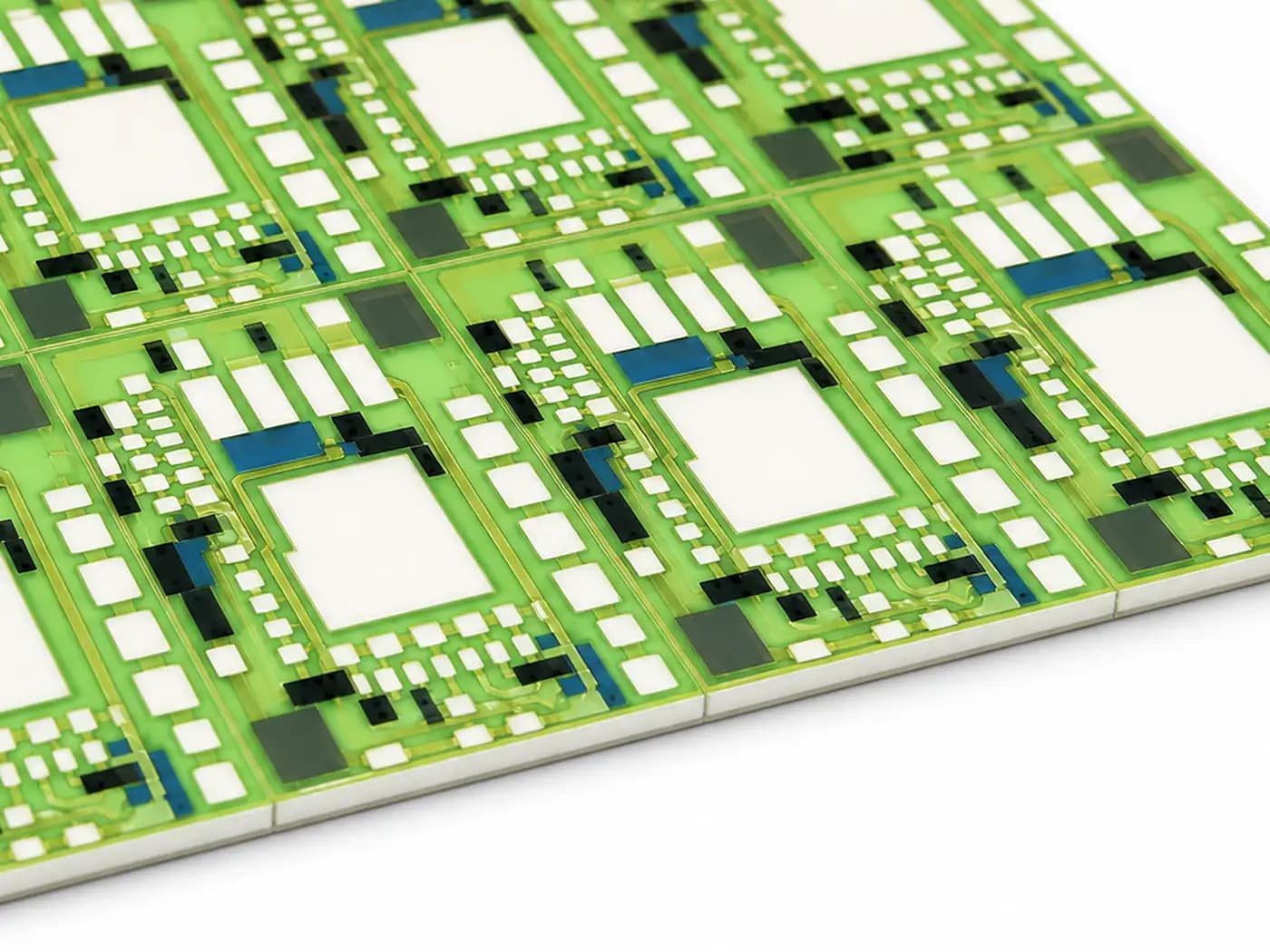 Close photograph of an actual alumina thick film circuit panel with printed functional regions